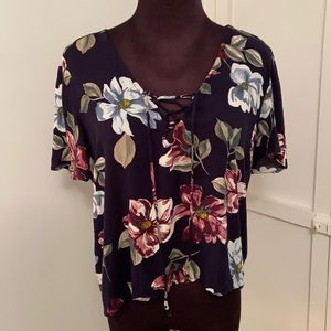 Kendall and Kylie Navy Blue Floral High-Low Short-Sleeve Blouse with Cross Tie